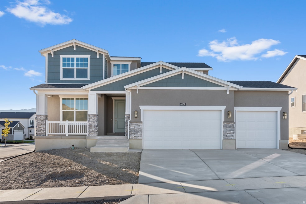 Craftsman-style home featuring stone siding, concrete driveway, a garage, and stucco siding