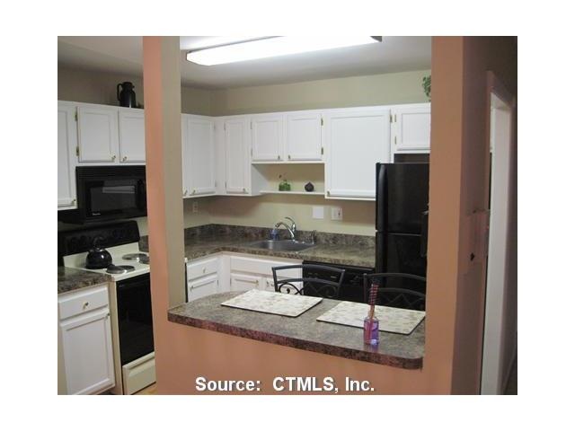 Kitchen. Breakfast Bar for 2 - Wall was lowered to