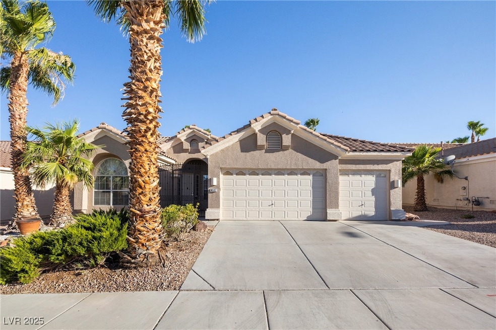 View of front of property with stucco siding, an a