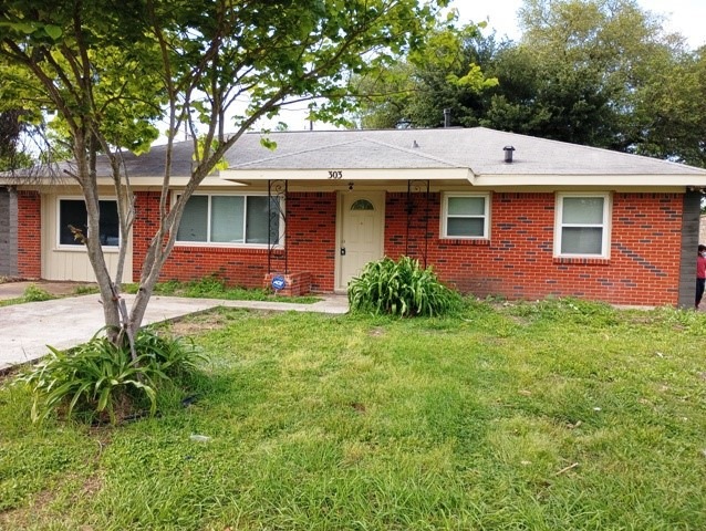 303 Bizerte St, Houston, TX 77022 - photo 1
