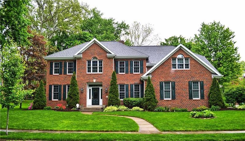 Curb appeal abounds in this custom 4BR 3Bath build