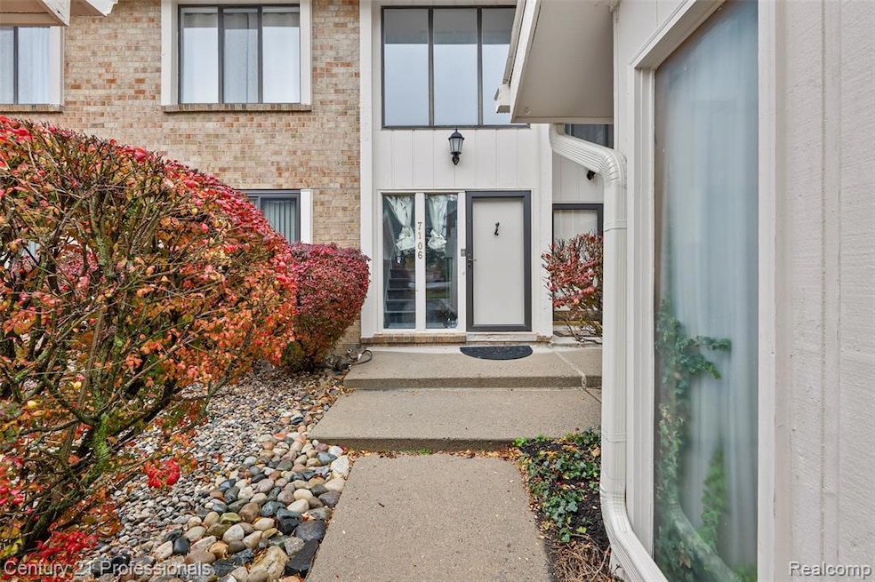 Entrance to property with brick siding