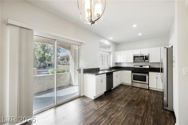 Kitchen featuring appliances with stainless steel