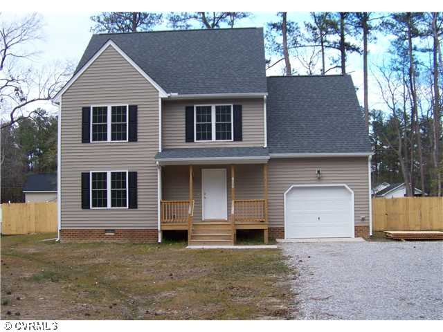 Exterior Front - Front Elevation Showing Privacy F