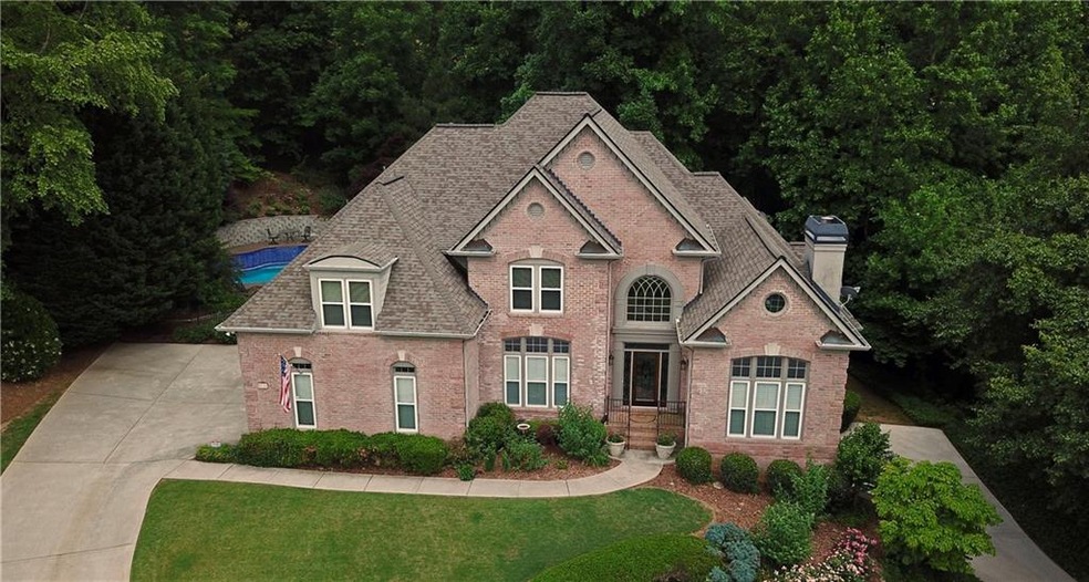 Large Brick Home with pool and 3 car garage overlo