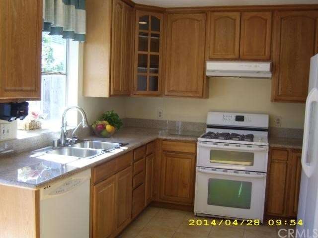 newer kitchen with granite counter top