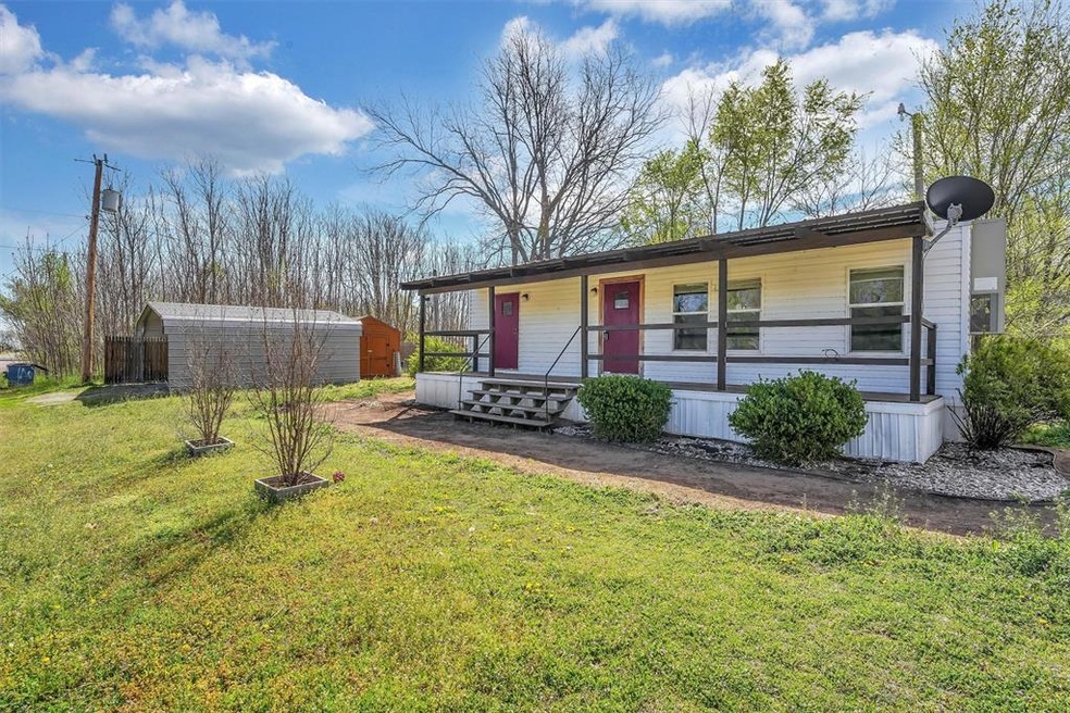 Tiny Home on Corner Lots. View of front of propert
