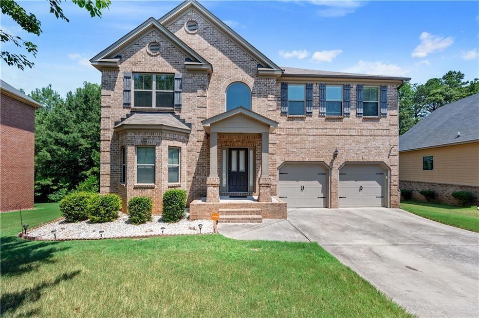 View of front of house featuring brick siding, con