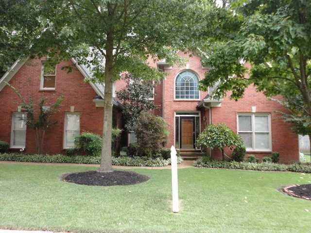 Gorgeous curb appeal with awesome landscaping
