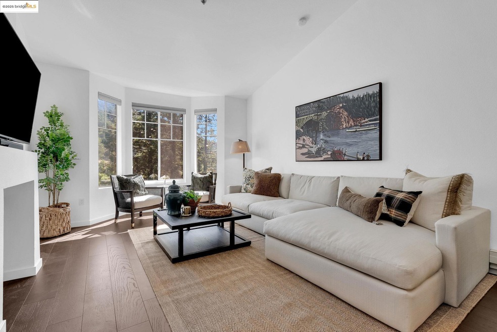 Living area featuring wood finished floors and baseboards