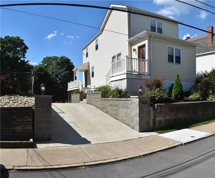 EXTERIOR FRONT AND DRIVEWAY