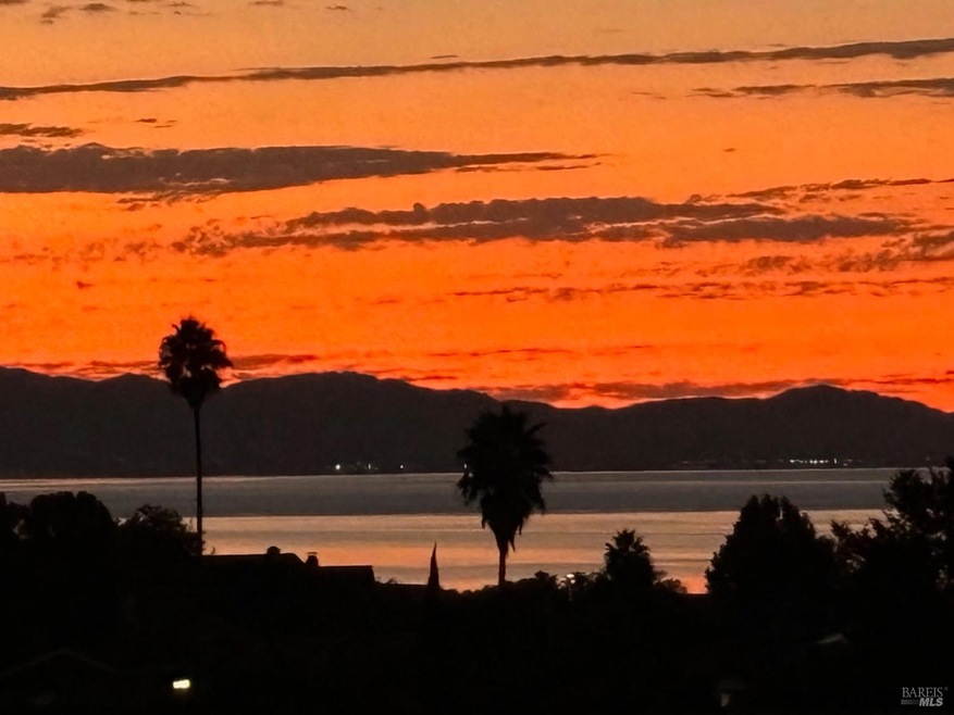 Enjoy the gorgeous sunsets with the bay in the background from the backyard