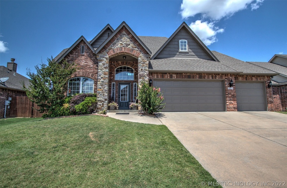 Welcome to this Jenks home with 5 bedroom home wit
