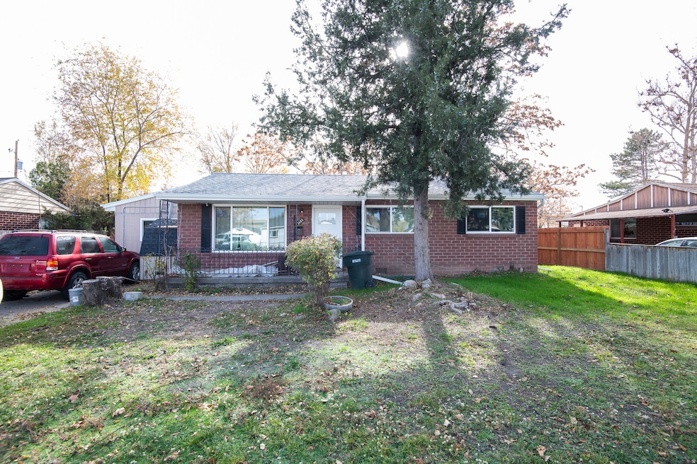 View of front of home featuring brick siding