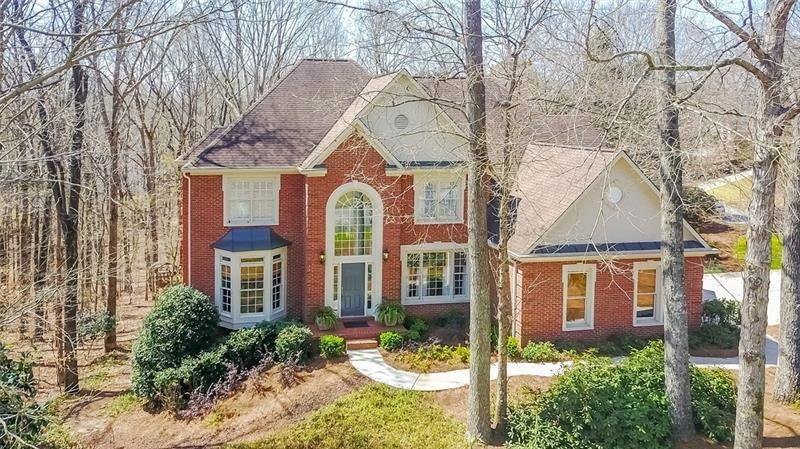 Three sides brick estate home on almost one half a