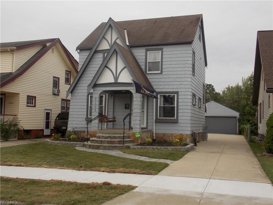 Charming curb appeal in this Tudor Colonial.