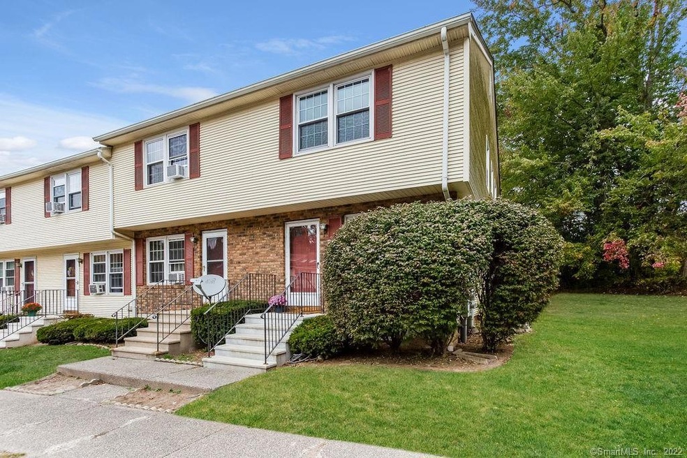 Beautiful end unit with private side yard.