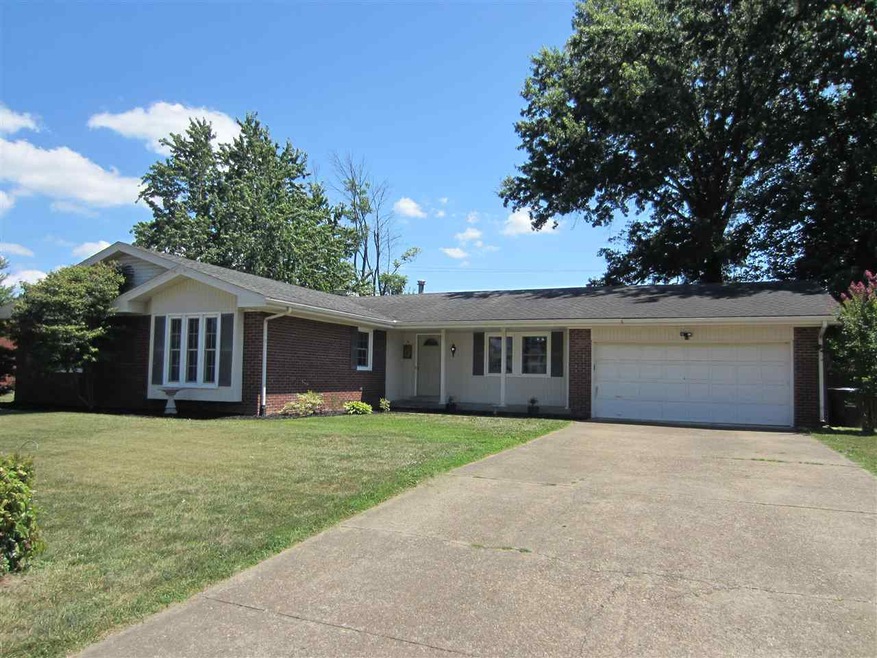 Sprawling all brick ranch with generous sized room