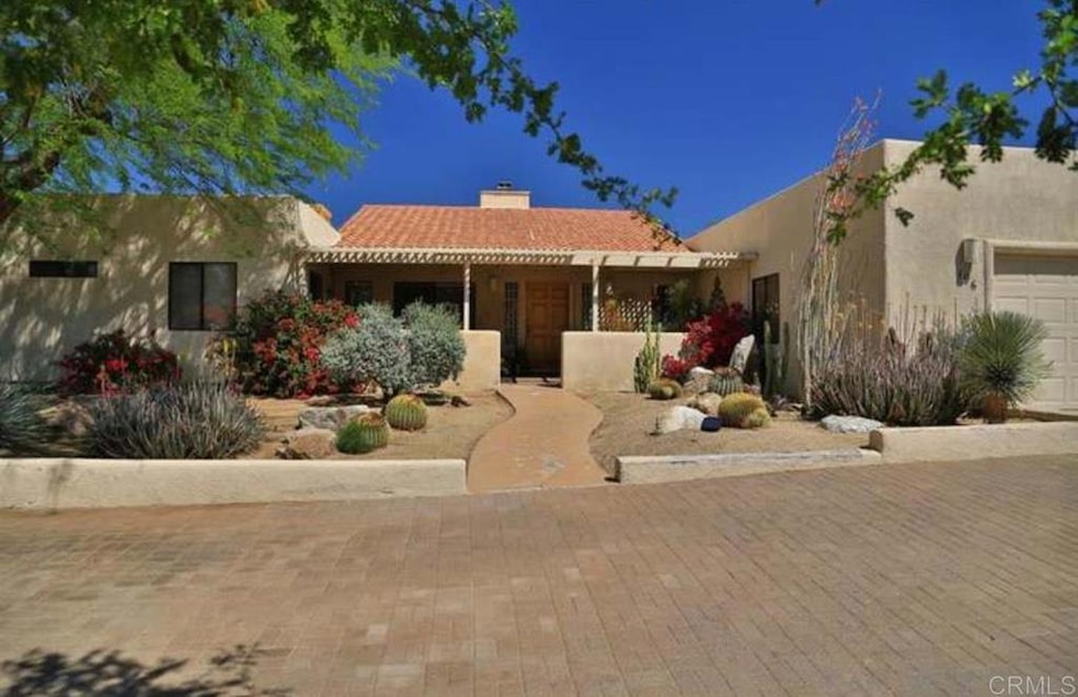 Front exterior with yard on 0.39 acre lot