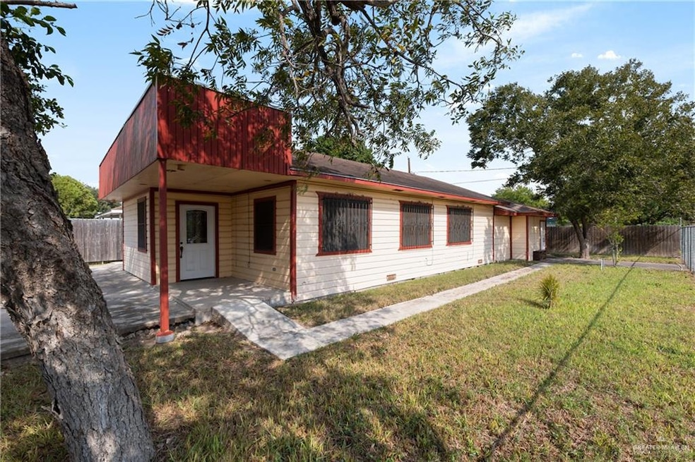 Single story home featuring a front yard and a patio