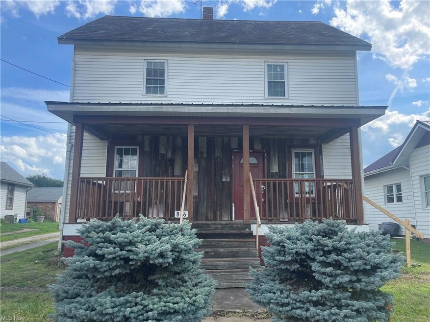 View of front of property with a porch