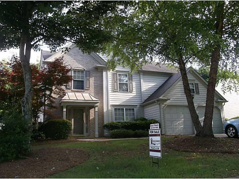 Exterior Front. Beautiful Landscaping