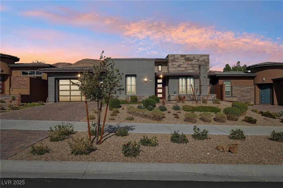 Contemporary home with stone accent, decorative dr