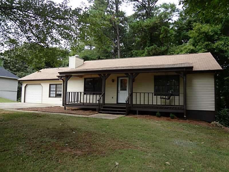 Exterior Front. Large comfortable front porch with swing to spend your evenings relaxing.