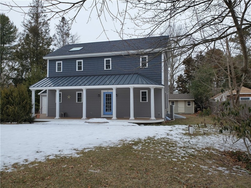 Front with shed in rear yard
