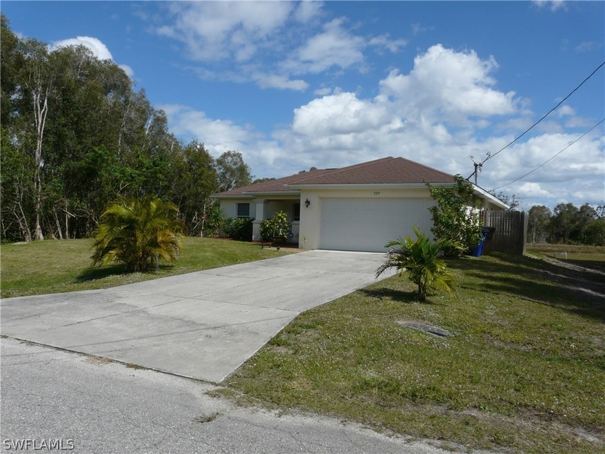 729 Kalamar Dr, Lehigh Acres, FL 33974 - photo 1