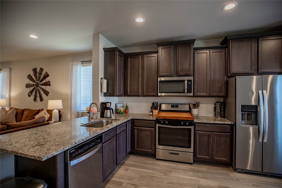 Prepare to elevate your cooking in this striking kitchen with 42