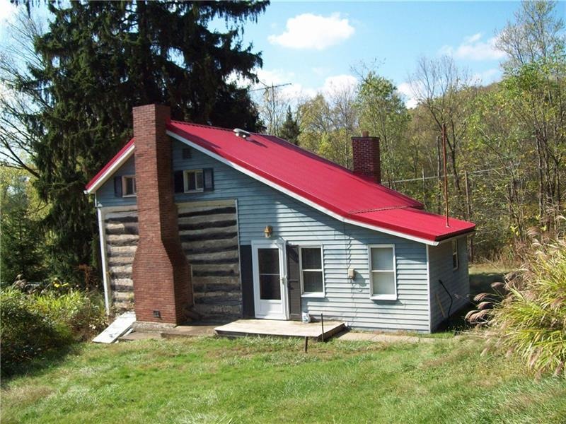 SIDE VIEW OF HOUSE