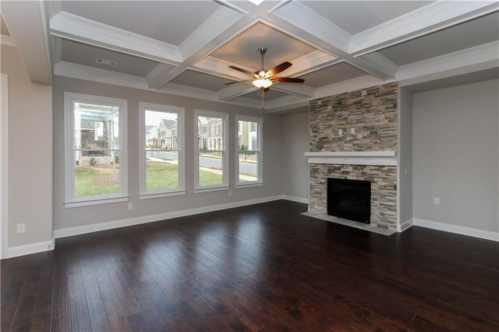 Bright and cheery family room with lots of windows