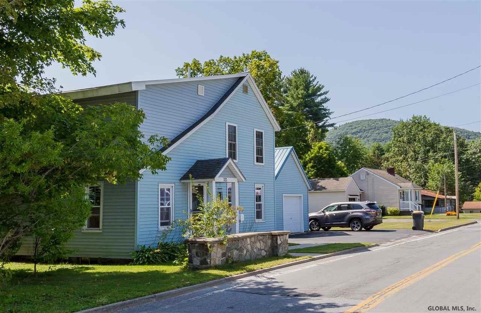 323 W Maple St, Corinth, NY 12822 - photo 1