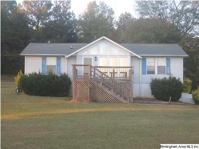 Front view of home - beautiful lightly tinted floo