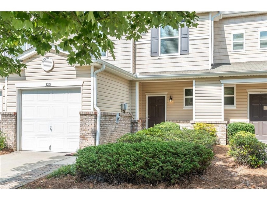 Welcome home to this lovely 3-bedroom townhome in 