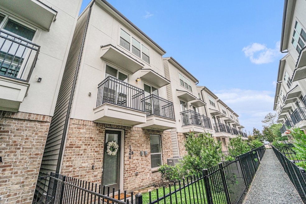 Front door and bedroom window, LR balconies & prim