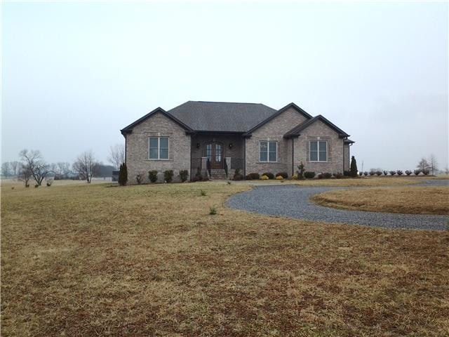 FRONT VIEW OF HOME... IMMACULATE CONTEMPORARY ON 5 LEVEL ACRES!