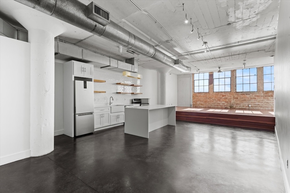 SoCo Urban Lofts unit 1004, Dallas, TX 75202 - photo 1