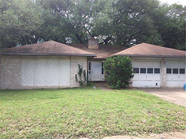 Front of house view from street.