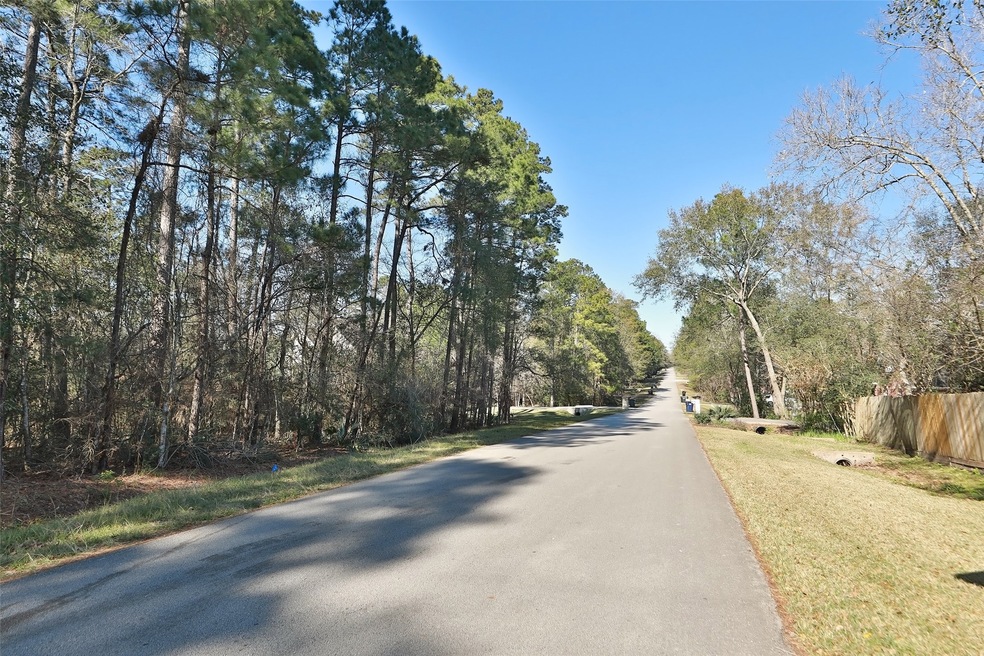 Beautiful 1/2 acre wood lot to build your dream home!  To the RIGHT of the intersection of Carriage lamp and Carriage Run.  Existing home on right hand side will be boundary that runs to the center of woods.. Stake visible