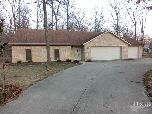 Excellent all brickranch on a wooded setting, with