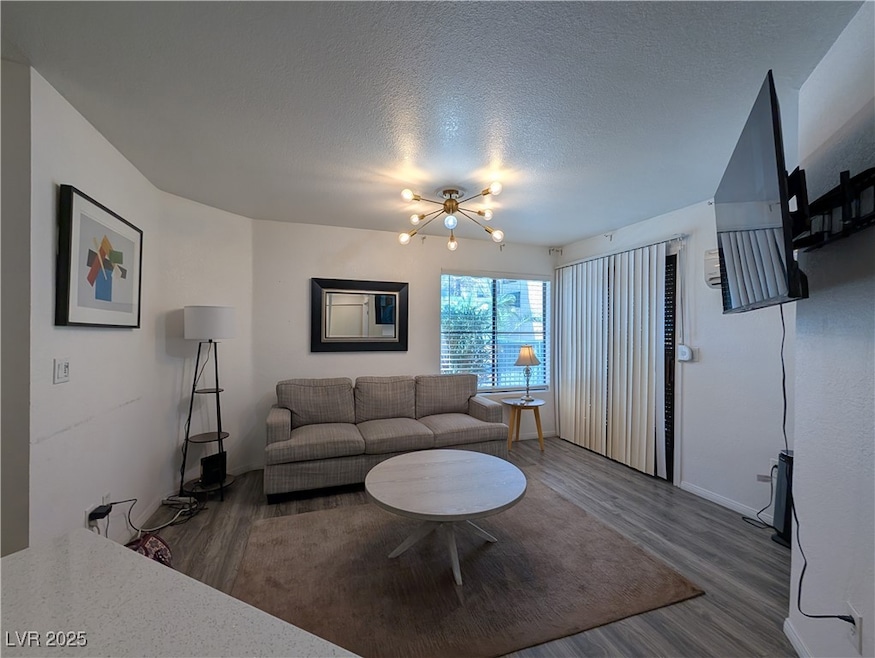 Living area featuring with neutral flooring