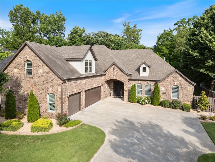 Welcome home to a large driveway and side load ove