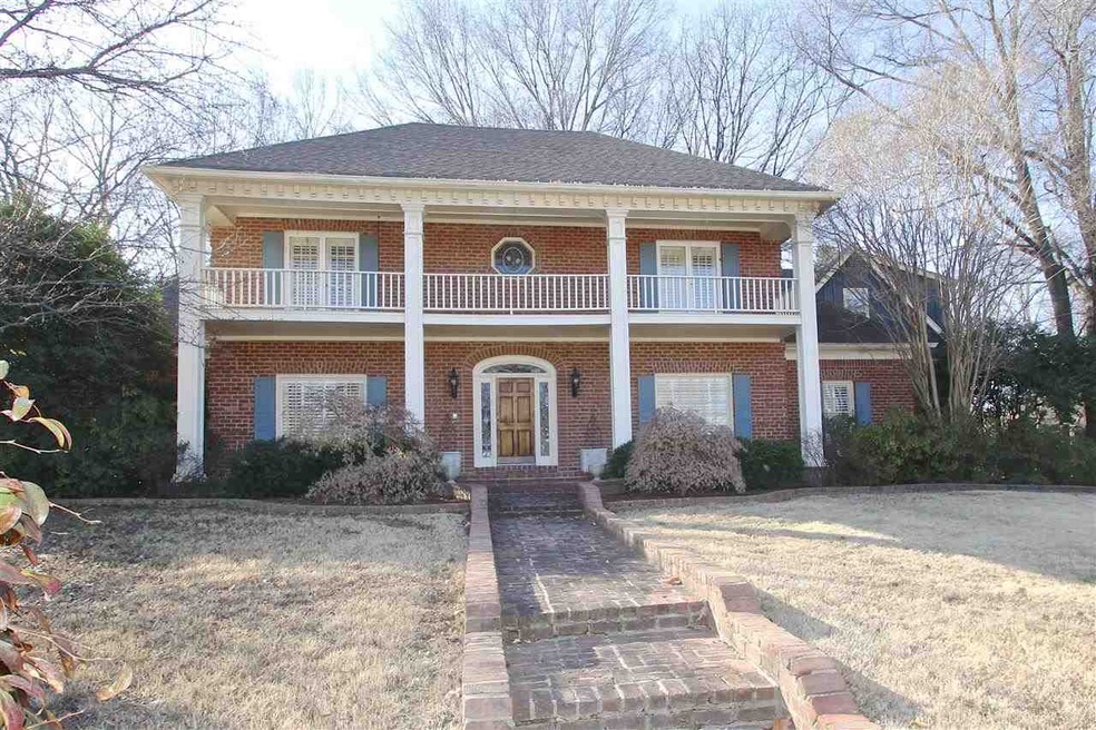 Welcome home to this spectacular 2-story brick hom