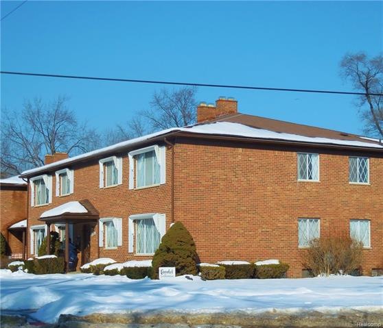 EXTERIOR OF THIS SPACIOUS, GROUND FLOOR RANCH UNIT