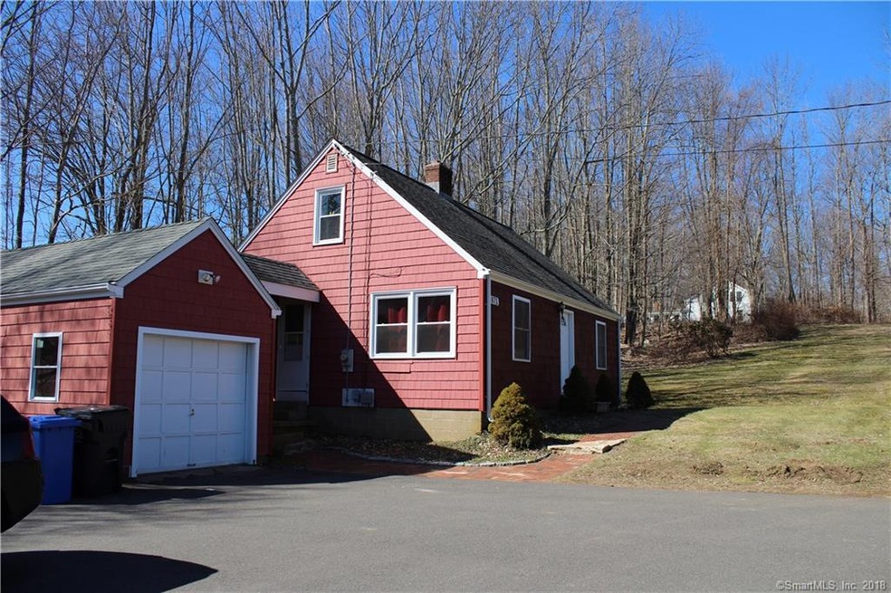 Nice cape, with paved parking lot.