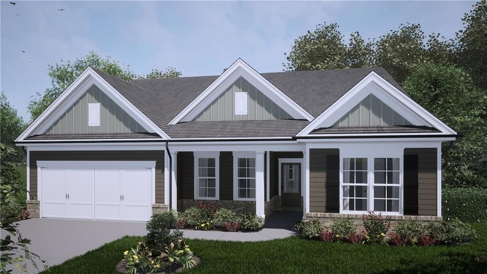 View of front facade featuring covered porch, driv