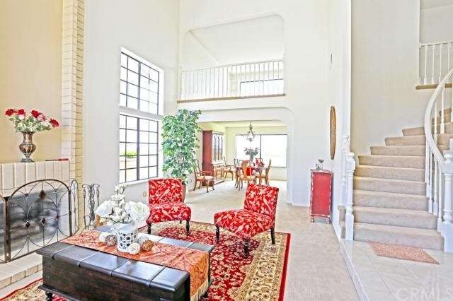View of winding staircase and open loft above. New