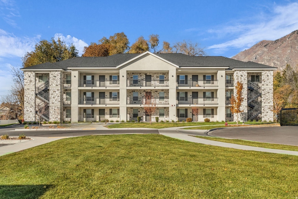 View of apartment building / complex with a mountain view